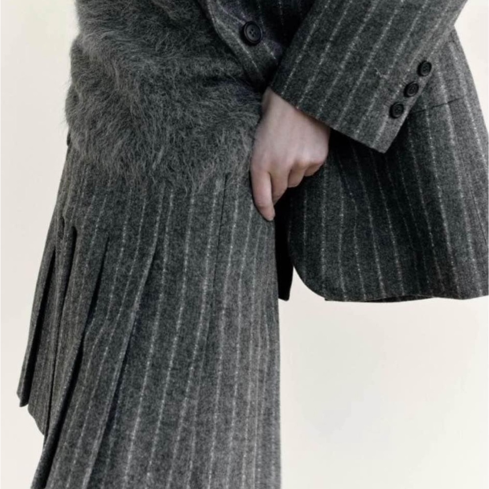 Pleated wool mini skirt